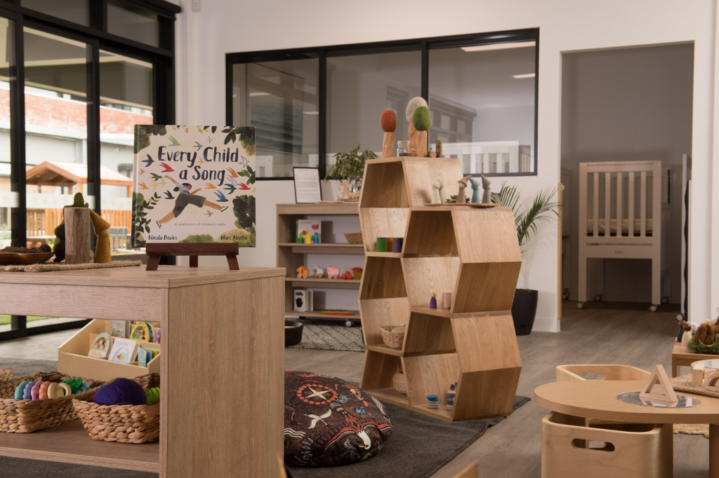 Childcare centre babies room complete with play equipment and activities at Fitzroy ELC